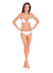 Image showing Bikini, fashion and sexy portrait of woman in studio, white background and mock up with pride. Happy, model and girl in underwear with confidence for summer, vacation or swimwear style for holiday