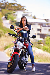 Image showing Woman, portrait and motorcycle in city with helmet for road trip, travel or outdoor journey in nature. Extreme female person or biker in confidence for ride, transport or sightseeing in an urban town