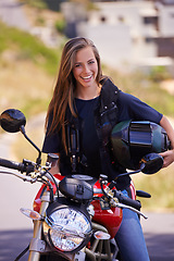 Image showing Portrait, smile and outdoor with woman, motorbike and extreme sports with helmet and safety. Face, person and girl with transport and travel with adventure and journey with rider, joyful or road trip