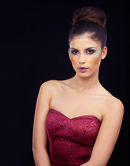 Image showing Fashion, makeup and portrait of woman in studio with dress for elegant, trendy and classy outfit for beauty. Cosmetics, confident and beautiful female model with fancy style by gray background.