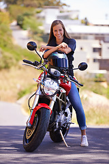 Image showing Portrait, road trip and outdoor with woman, motorbike and extreme sports with helmet and smile. Face, person and girl with transport and travel with adventure and journey with rider, joyful or safety