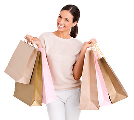 Image showing Fashion, shopping and portrait of woman on a white background with bag for sale, discount and deal. Excited, happy customer and isolated person for retail products, consumerism and purchase in studio