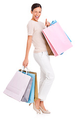 Image showing Woman, wink and shopping bags for fashion retail with promotion for customer discount, sale or deal. Female person, studio and mockup space for boutique gift product, white background or giveaway