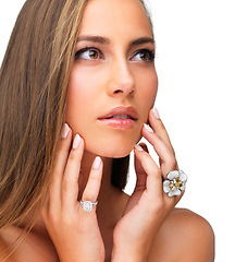 Image showing Skincare, beauty and woman touch face for wellness, shine or thinking isolated on a white studio background. Hands, cosmetic and serious model in spa for facial makeup, glow or dermatology with rings