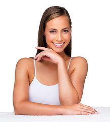 Image showing Portrait, skincare and happy woman on table for wellness or health isolated on a white studio background. Face, cosmetics and smile of model on desk in spa for facial makeup, beauty and aesthetic