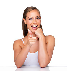 Image showing Makeup, portrait and happy woman with hand pointing at you in studio for beauty, sale or deal on white background. Cosmetics, announcement and face of female model with idea for diy glowing skin