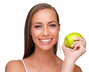 Image showing Portrait, smile and apple for health with woman in studio isolated on white background for wellness. Face, diet and nutrition with happy young vegan model holding organic green fruit for detox