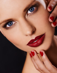 Image showing Portrait, makeup and manicure with woman isolated on dark background for cosmetics or satisfaction. Salon, red lipstick and nail polish with confident young model in studio for beauty or wellness