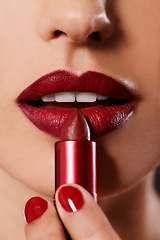 Image showing Closeup, woman and red lipstick with nails and makeup for beauty, application of cosmetics and shine. Lipcare product, bold color and manicure with mouth, face and skin for cosmetology with glow