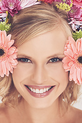 Image showing Woman, portrait and flowers on crown for beauty, happiness and wellness with spring aesthetic and floral art. Model, face and cosmetics with carnation plants for facial glow, skincare and headband