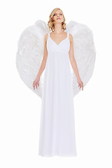 Image showing Woman, face and fantasy in studio with angel wings for halloween dress up, celestial fashion or confidence. Model, person and beauty with heavenly costume, relax or natural makeup on white background