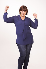 Image showing Woman, portrait and arms for celebration in studio for achievement victory, congratulations or white background. Female person, face and good news for winning confident for prize, promotion or bonus