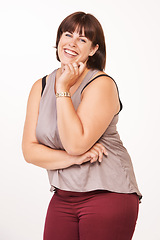 Image showing Portrait, smile and fashion with plus size woman in studio isolated on white background for style. Comedy, funny and laughing with happy young model in trendy or casual clothing outfit for humor