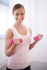 Image showing Woman, portrait and dumbbell for weight training at home with exercise, smile and workout. Happy, wellness and gym equipment for health and sport with fitness for arm strength and confidence in house