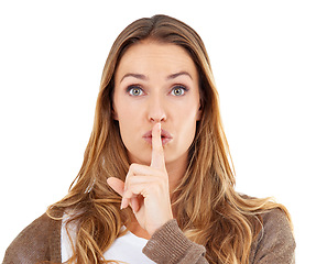 Image showing Woman, shush and portrait for mystery in studio, symbol and confidential info or emoji. Female person, finger and privacy icon for quiet on white background, opinion and silence for announcement