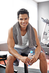 Image showing Happy, man and portrait at gym with water bottle for recovery after exercise and body building. Healthy, fitness or person relax after workout with liquid hydration for benefits to wellness in Mexico