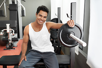 Image showing Bench, weights and portrait of man at gym with happiness for workout as body builder in Mexico. Healthy, person and smile after weightlifting exercise for strong muscle, fitness and training arms