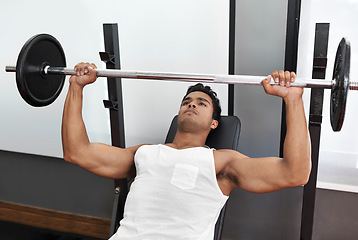 Image showing Bench, press and exercise at gym with man in workout for body building in Mexico. Healthy, person and weightlifting challenge for strong muscle, fitness or progress in training with barbell in club