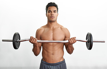 Image showing Man, portrait and barbell for arm workout fitness or curl training for muscle strength, performance or exercise. Bodybuilder, equipment and white background in studio for health, biceps or mockup