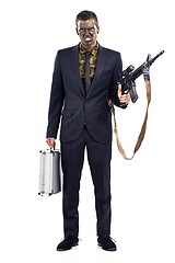 Image showing Business man, gun and portrait for war with briefcase, anger or camouflage with face paint in studio. Person, assault rifle and corruption in military gear for deal, conflict or weapon sales in USA