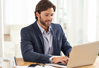 Image showing Desk, laptop and businessman typing report, email or market research with financial analyst in office. Consultant, business advisor or man with computer, writing online review and feedback at startup