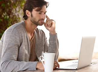 Image showing Businessman, laptop or reading or research outdoor with coffee for remote work, relax or freelance writer. Entrepreneur, person and face or technology for project or online planning in nature at cafe