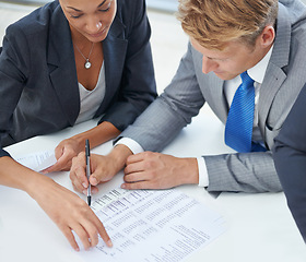 Image showing Accounting, documents and finance with business people in boardroom of office for planning from above. Collaboration, paper and planning with corporate employee team reading bank data in workplace