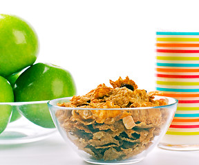 Image showing cornflakes, glass of milk and green apples