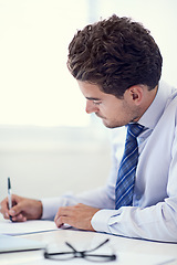 Image showing Businessman, writing notes and document for planning, office and professional workspace. Male person, company and brainstorming for client, startup and entrepreneur for career and corporate