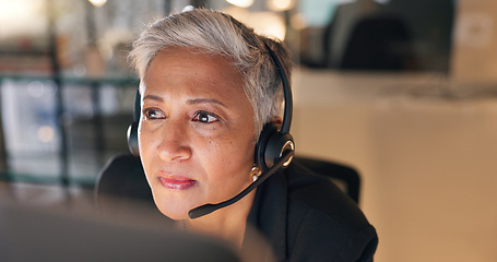 Image showing Call center, woman and consultant in office at night for online consultation with overtime. Reading, technology and senior female agent with technical support, customer service or telemarketing job.