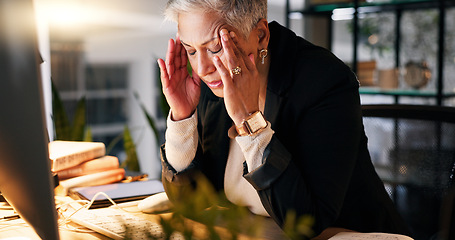 Image showing CEO, stress and headache by computer in office with tension for burnout, frustrated and overworked at night. Woman, boss and anxiety with hand on temples for pressure, migraine and pain at workplace