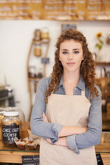 Image showing Portrait, welcome and girl with confidence in restaurant for service with small business owner in store. Coffee shop, cafe or woman manager with pride, hospitality or entrepreneur at startup bakery.