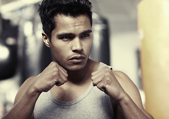 Image showing Man, boxer and training at gym fitness for health, wellness and professional in posture. Strong male trainer, workout and building strength with energy competition, mma and active in sports exercise