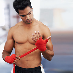 Image showing Wrap, man and boxer hands for sports, competition and fitness in fight practice. Training mma person, workout and exercise as activity for hobby, professional and wellness for health and energy