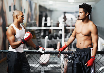 Image showing Fitness, talking and fighter in gym with coach for training, self defense or combat training. Exercise, sports or boxing with shirtless man and personal trainer in preparation for competition
