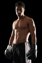 Image showing Portrait, man and boxer in studio for sports, training and workout for healthy body isolated on a black background. Fighter, serious athlete and person with gloves for fitness or exercise in Brazil