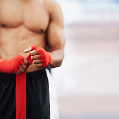 Image showing Man, hand and wrap for mma, protection and strength at fitness and workout studio with mockup. Person with strap, fist or fingers to bandage and protect for exercise, training or competitive fighting