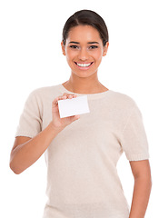 Image showing Woman, portrait and card mock up in studio for marketing of information, presentation or contact us. Face of young person or casual model in t shirt with paper and space for tag on a white background