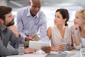 Image showing Business people, teamwork and tablet for research in meeting with speaker for corporate planning, brainstorming or diversity. Collaboration, group and employees with technology and discussion at work