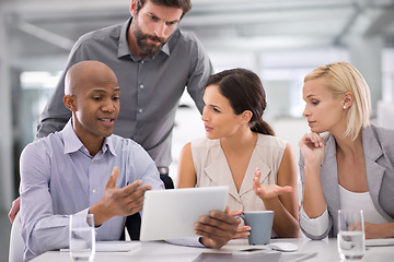 Image showing Business people, teamwork and tablet for planning in meeting with speaker for corporate research, brainstorming or diversity. Collaboration, group and employees with technology and discussion at work