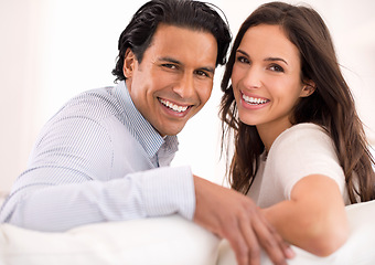 Image showing Relax, love and portrait of couple on couch for weekend bonding, romance and connection in home. Happy, support and trust in marriage, man and woman on sofa with embrace, wellness and smile.