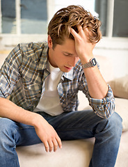 Image showing Man, couch and headache pain with hand for mental health burnout or overworked or frustrated, tired or depressed. Male person, sofa and migraine with vertigo in London or stress, worry or overwhelmed