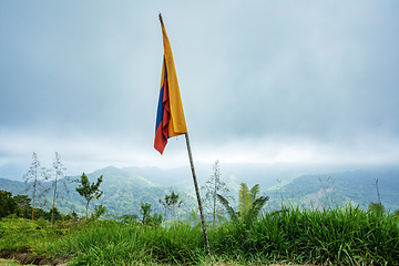 Image showing Landscape of Sierra Nevada mountains with colombian flag, Colombia wilderness landscape.