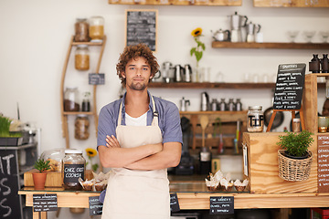 Image showing Portrait, welcome and man with confidence in restaurant for service with happy small business owner. Local coffee shop, cafe or bistro manager with smile, hospitality or entrepreneur at startup store