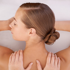 Image showing Spa, top view and woman or hands with massage for relax, luxury treatment and satisfaction with towel. Person, face and masseuse for body care, pain relief and comfort with calm, wellness or skincare