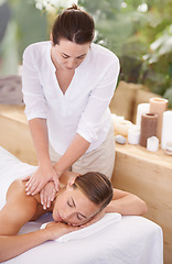 Image showing Spa, woman and masseuse with massage for relax, luxury treatment and satisfaction with towel outdoor. Person, face and wellbeing for body care, pain relief and comfort with wellness and skincare