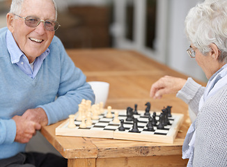 Image showing Happy, couple and senior in game of chess together to relax in retirement on holiday or vacation. Elderly, man of woman outdoor with smile for winning competition, checkmate or activity with strategy