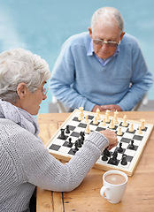 Image showing Chess, strategy and old couple thinking while playing a board game in the backyard or bonding together. Mind, relax or challenge with an elderly man or senior woman in the garden for problem solving