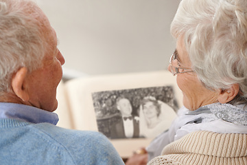 Image showing Old couple, photo album and memory nostalgia to remember wedding in retirement for connection, bonding or together. Elderly man, woman and photography book for union commitment, rear view or past