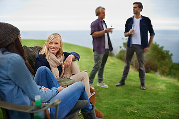 Image showing Friends, men and women with drinks for relax on grass in nature with happiness for holiday and vacation. People, smile and alcohol in countryside or lake for adventure, travel and bonding in forest